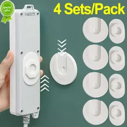 NYA 4 SETS Självhäftande skrivbordsuttag Fixer Punch Free Cable Organizer Power Strip Holder Row Plug WiFi Router väggmonterade krokar