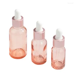 Garrafas de armazenamento vazias 10ml 15ml 30ml frasco conta-gotas de vidro rosa com pipeta recarregável óleo essencial frascos de cosméticos por atacado 20pcs