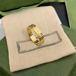 Luxurys Nail Ring Mens Ring Rings Designer Fashion Titanium Steel Graved Letter Mönster Designer Ring Förlovningsring Storlek 5-10 Ringar för kvinnor Grossist