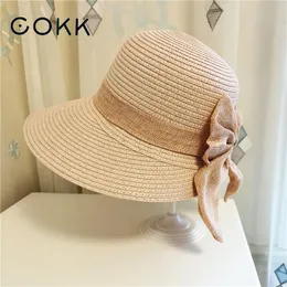 قبعات صيفية من COKK للنساء قبعة كبيرة واسعة من القش مع القوس في الهواء الطلق للشاطئ والسفر ظلة قبعة بحافة قابلة للطي قبعة جديدة Gorro