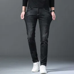 Męski projektant dżinsów ciężkie czarne szare dżinsy jesienią i zimą, męskie towary europejskie, hafty wielkie marki, szczupłe spodnie, popularne wśród młodych ludzi GSFQ
