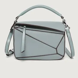 Designer väskor lyxiga handväskor kvinnor crossbody väska geometrisk skarv litche mönster mode mångsidig klassisk tote väska lätt kapacitet hög kvalitet pu