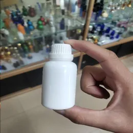 Hot Sale White Porcelain 30 ml droppflaskor med manipuleringslock för eterisk olja 1 oz 1000st inkluderar frakt JVOCM