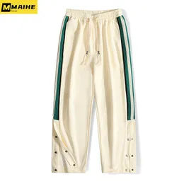 Calças masculinas da moda primavera calças largas de pernas largas elásticas cintura lateral com seios retos calças de nove pontas y2k streetwear calças masculinas 230628