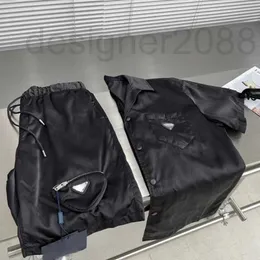 Traje deportivo de diseñador para hombre Camisas de nylon Camiseta de lujo Triángulo de metal Impermeable Top Moda Pantalones cortos de secado rápido Conjunto CDOG