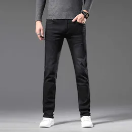 Jeans da uomo firmati Guangzhou Xintang Pantaloni slim fit coreani Slim Fit Thick European Youth Pure Black Autunno e Inverno Fashion Brand 7AWJ JVQ5