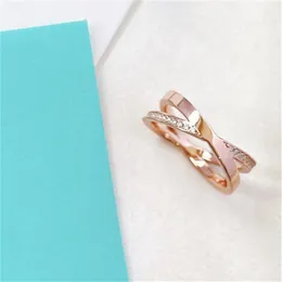 Anel de luxo feminino rosa ouro moda marca de alta qualidade luxos masculino anéis de diamante das mulheres designer jóias 2021218s