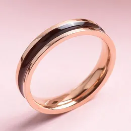 Anello smaltato bianco nero di nuova moda Gioielli in acciaio inossidabile placcato oro rosa stile INS di lusso da 4 mm