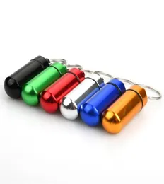 15 Pack Pill Box Keyring Färgglada aluminiumlegering Piller Behållare Vattenbeständig nyckelring Emergency Stash Pill Holder för utomhus28507018