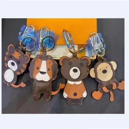 Keychains Lanyards Lion Tiger Monkey Bear Luxury Designer Leather Key Chain Laser Embossed Bag Pendants With Box 1853231E Drop Del273E