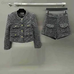 Dwuczęściowe spodnie dla kobiet projektant 2023 Autumn/Winter New Cha Nanyou Okrągła szyja pojedyncza piersi gruby płaszcz z płaszczem biodrowym z wysokim talią dla kobiet LK25