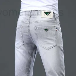 Jeans pour hommes Designer Jeans de luxe pour hommes Printemps / Été Slim Fit Pieds Élastique Casual Pantalon en coton MI6R