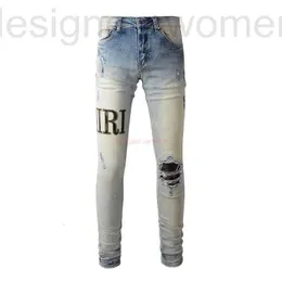 Men's Jeans Designer Clothing Amires Denim Pants 878 High Street Made Wornout Distressed Camouflage Letters Patchwork Leather Slim Fitting Small Leg 477N