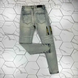Męski projektant dżinsów HM591 Slim dżinsy w trudnej sytuacji jeansy białe skórzane spodnie z otworami litery rozdarte kolano rozbite chude proste rozmiar nogi 28-40 długości 2023