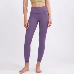Tela de lycra Color sólido Mujeres yoga Leggings Suave Cintura alta Levantamiento de cadera Elástico T-Line Pantalones deportivos para mujer Elástico al aire libre Fitness Lady Sports