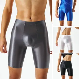 Męskie szorty seksowne elastyczne stałe kolor średniego wieżowca U Convex Gym Men Blosy Ice Silk Fitness Beach Briefs Flame Boxer Club Zużycie