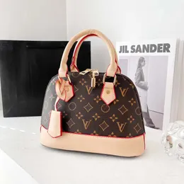 Luxur Designer Bag Womens Alma Series Handväska axelväska skalväska plånbok crossbody väska mini handväska