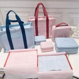 Haute qualité bébé sacs à couches maman maternité sac à main ensembles enfants porte-bouteille mère femmes sac à bandoulière pour poussette 3562