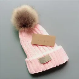 Designer Bambini Cappelli lavorati a maglia Berretti pompon invernali Ragazzi Ragazze Pom Cappellini con teschio Cofano Etichetta trendy Cappello all'uncinetto Berretto lavorato a maglia Caldo paraorecchie