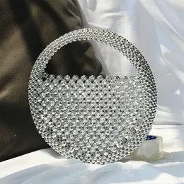 2023 New Round Dinner Bag Handmased Diamond Pärled Handbag Party Outding Fashion Light Luxury Wrist Bag 23101010