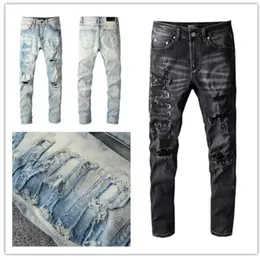 Luxurys Designer Mens Jeans最新のリスティングストリップレターデニムパンツファッションリッピングカジュアルなhomme男性ホールズボンサイズw29-40271f