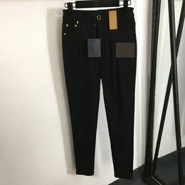 Wysokie talia Slim Pants Designer dżinsy spodnie Trendy skórzany ozdob