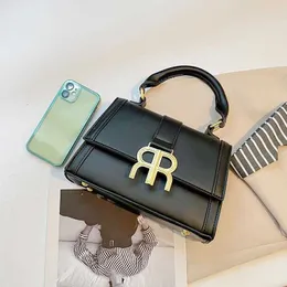 23 Nya väskor Solid Color Trend Fashion Advanced Sense Bag Single Shoulder Oblique Straddle Handheld Panel Small Square