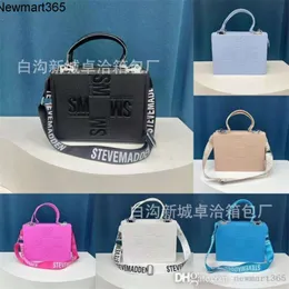 Atacado 2023 outono nova bolsa feminina personalizada em relevo moda versátil ins grande capacidade portátil crossbody sacola