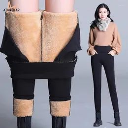 Kvinnors byxor athvotar vinter lambwool varm för kvinnor sammet förtjockad hög midja mager utanför kläder leggings med fickor