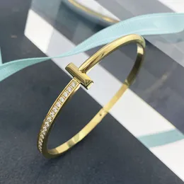 T Guldarmband designer smycken kvinnor märke mode armband lysande rostfritt stål smycken silver rosguld icke allergisk och icke -blekande män diamantarmband