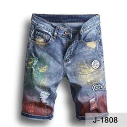 Pantalones vaqueros cortos para hombre Pantalones de motociclista con pintura en color Agujeros rasgados ajustados Pantalones cortos de mezclilla para hombre Jeans de diseñador228M