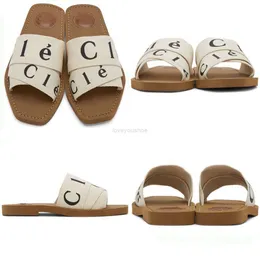 Slippers Sliders مصمم Woody Flat Mule Maison يزين وحيدًا داخليًا يجعل Essentia