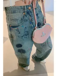 Calças de brim femininas coreia moda cintura alta solta graffiti impresso perfuração perna larga denim calças 2023 primavera casual em linha reta