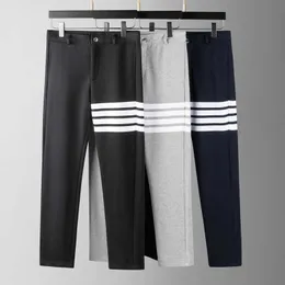 Pantaloni a 4 barre pantaloni in maglia a righe da uomo e da donna in autunno e inverno
