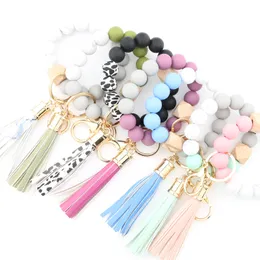 14 Farbe Holz Tael String Schlüsselbund Lebensmittelqualität Silikon -Perlenarmband Frauen Girl Key Ring Kette Writriemen anheize Lederparty Gunst