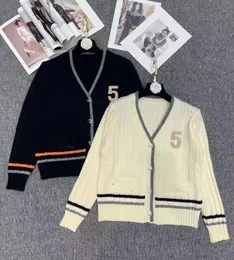 Tasarımcı Cardigan Kadınlar v Boyun Sweaters Uzun kollu pamuklu örgü kazak gevşek gündelik ceket katları ladys kol maglion giyim