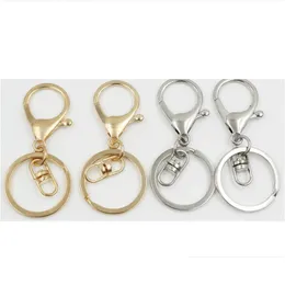 Andra hemträdgårdar Sier/Gold Biger Hummer Clasp Tone Nyckelkedjor Ringar runt Split Keychain Car Blank Home Garden Dhbaz