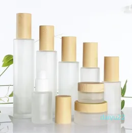 Partihandel Frosted Glass Cosmetic Jar Bottle Face Cream Pot Lotion Spray Pump flaskor med plastimitation Bambu lock