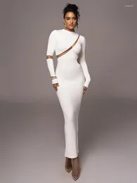 الفساتين غير الرسمية Mozision Turtleneck Long Sleeve Bodycon Maxi فستان للنساء الخريف المرقاء جوفاء خارج حفلة نادي Sexy Vestidos