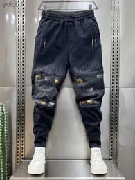 Jeans pour hommes Street Hip Hop Jeans Hommes Grille Couture Harem Pantalons de survêtement Nouveau dans la marque de créateurs Stackes Pantalons de cowboy en vrac Vêtements de modeL231017