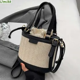 Evening Bags Womens Bag Trend Straw Woven Bucket Handmade Fashion Crossbody PU Stitching Summer Seaside Holiday Tophandle 231017