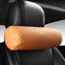 Cuscini di seduta Seggiolino auto Cuscino per il collo Poggiatesta Memory Foam in pelle Traspirante Cervicale Cilindrico Cuscino universale Sedia da ufficio Poggiatesta Q231018