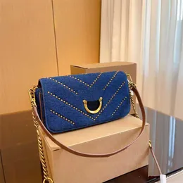 Üst kırlangıç ​​torbası piko denim çanta kadın vintage deri tasarımcı çanta kadın moda perçin omuz askısı çapraz çantalar zincir çantası 231013