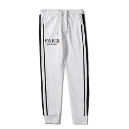 Mens Luxury Jogger Pants Märke med dragkammare Sportbyxor High Fashion Black White Colors Side Stripe Designer JOGGERS244S