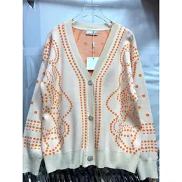 Alta versão local outono e inverno nova tendência temperamento idade reduzida cardigan com decote em v casaco de emagrecimento feminino