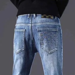 Herren Jeans Designer Herbst und Winter Herrenhose hellblau Korean Slim Fit Füße elastisch bedruckt VXEI176B