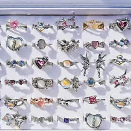 Pierścień Solitaire 10pcs/działka modna kreatywne serce kocie oko pierścienie opalowe dla kobiet vintage nieregularny różowy kryształowy geometryczny otwarte biżuterię mody 231019