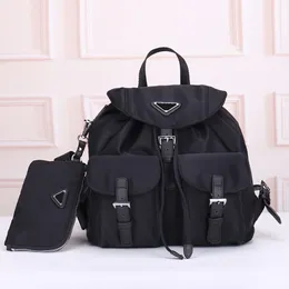 Fashion Newmen and women Backpack Quality Designer Bag Travel Bag Quality Nylon Leather Triangle Metal Logo Bookbag Travel Bag