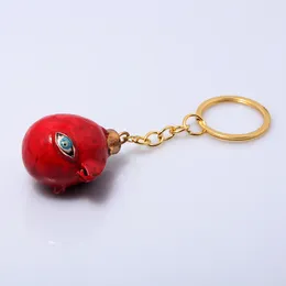 Schlüsselanhänger Anime Berserker Behelit Schlüsselbund Guts Griffith Ei des Königs Anhänger Vintage Seil Kette für Frauen Männer Cosplay Schmuck