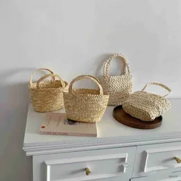Handbags INS Style Handmade Children's Bag Natural Grass Woven Portable Bucket Bag Basket Beach Bag Kids Fashion Accessories